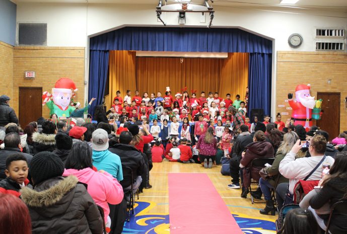 Students singing holiday songs