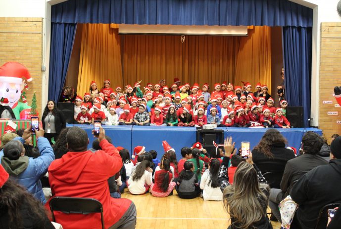 Students singing holiday songs